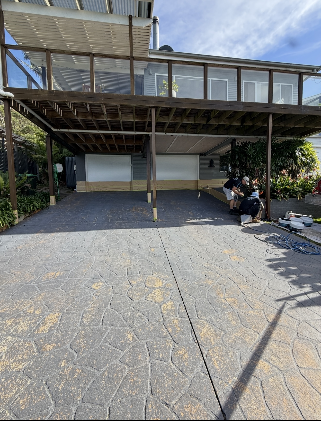 Team Applying Sealer