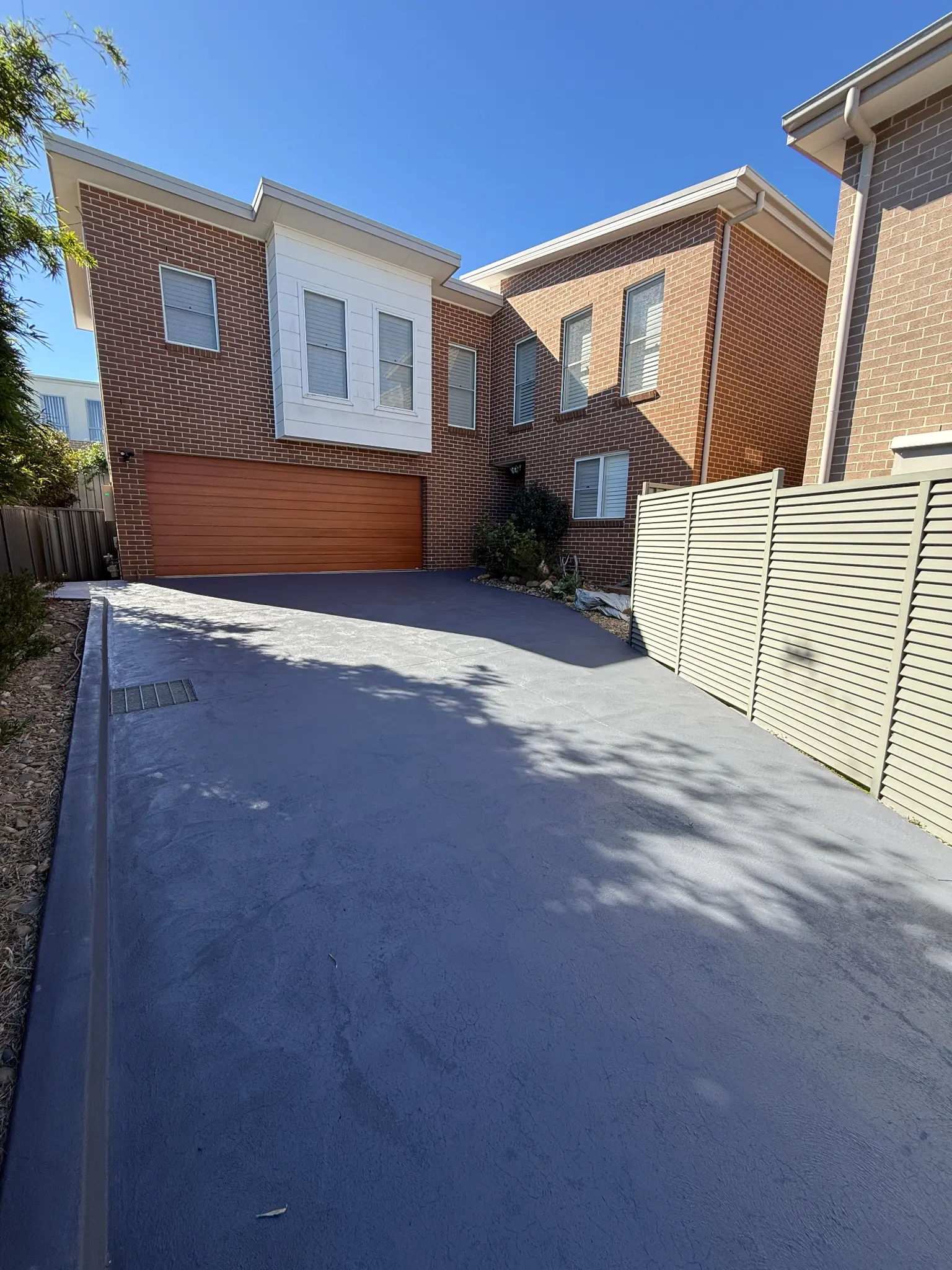 Charcoal Driveway — Brick Home